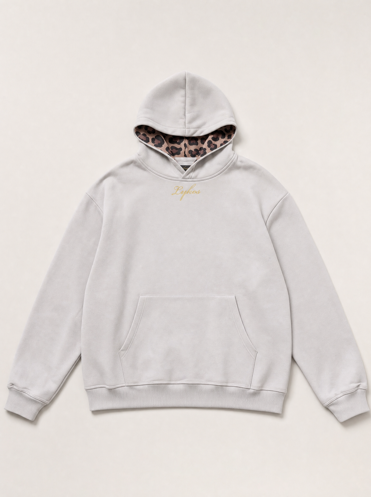 Origin Hoodie in grey, front, laid flat, with gold Lykos embroidery and leopard-lined hood